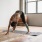 lifestyle image of a woman practicing a yoga pose at Tapestry Ridge in Covington, KY